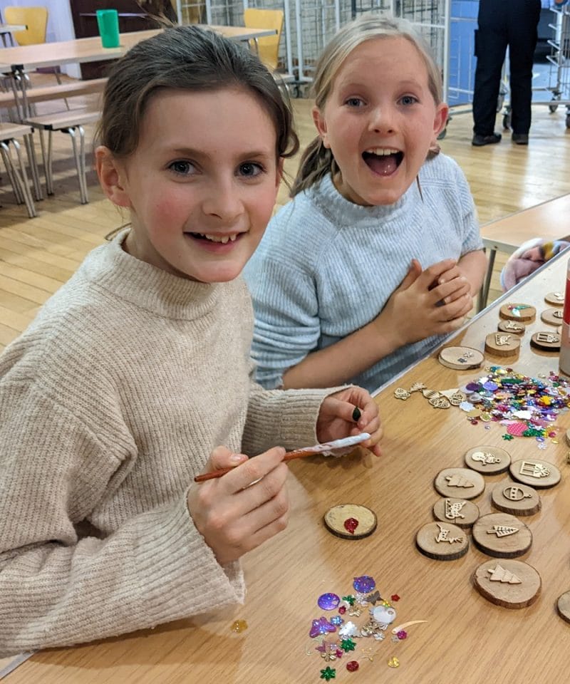 Pinewood boarders making Christmas tree decorations