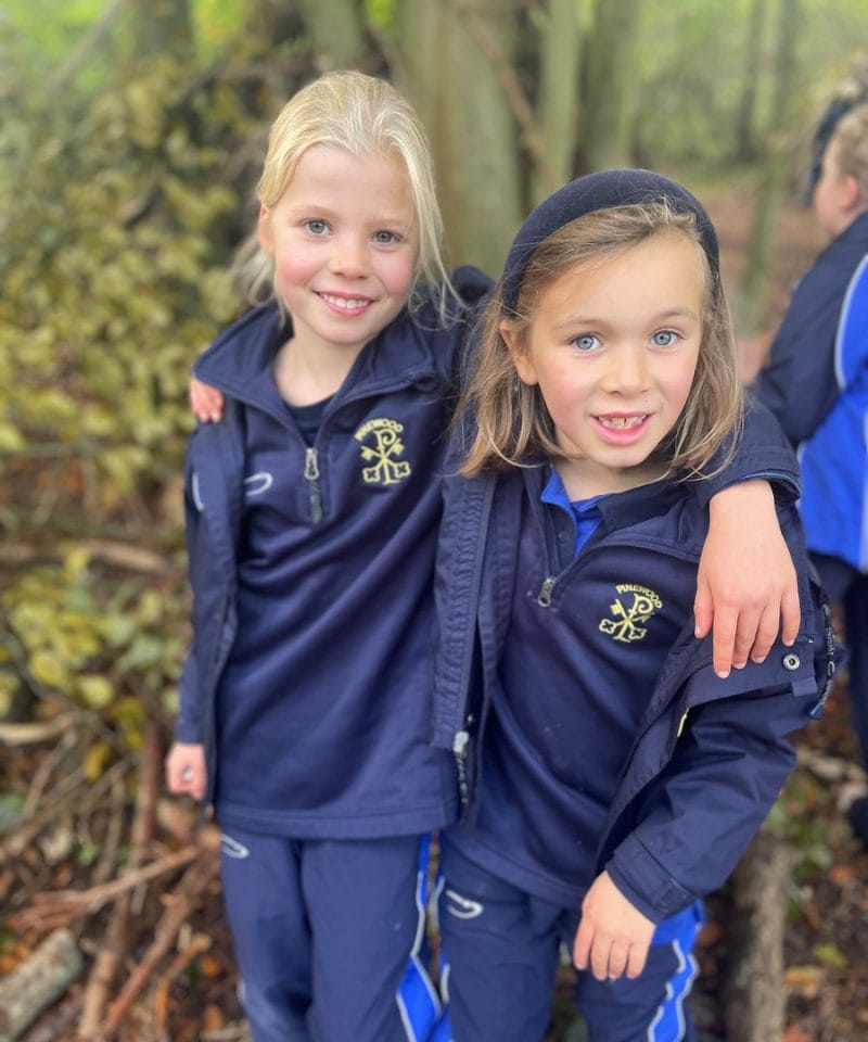 Pinewood prep school girls at a stone age day at Earth Trust