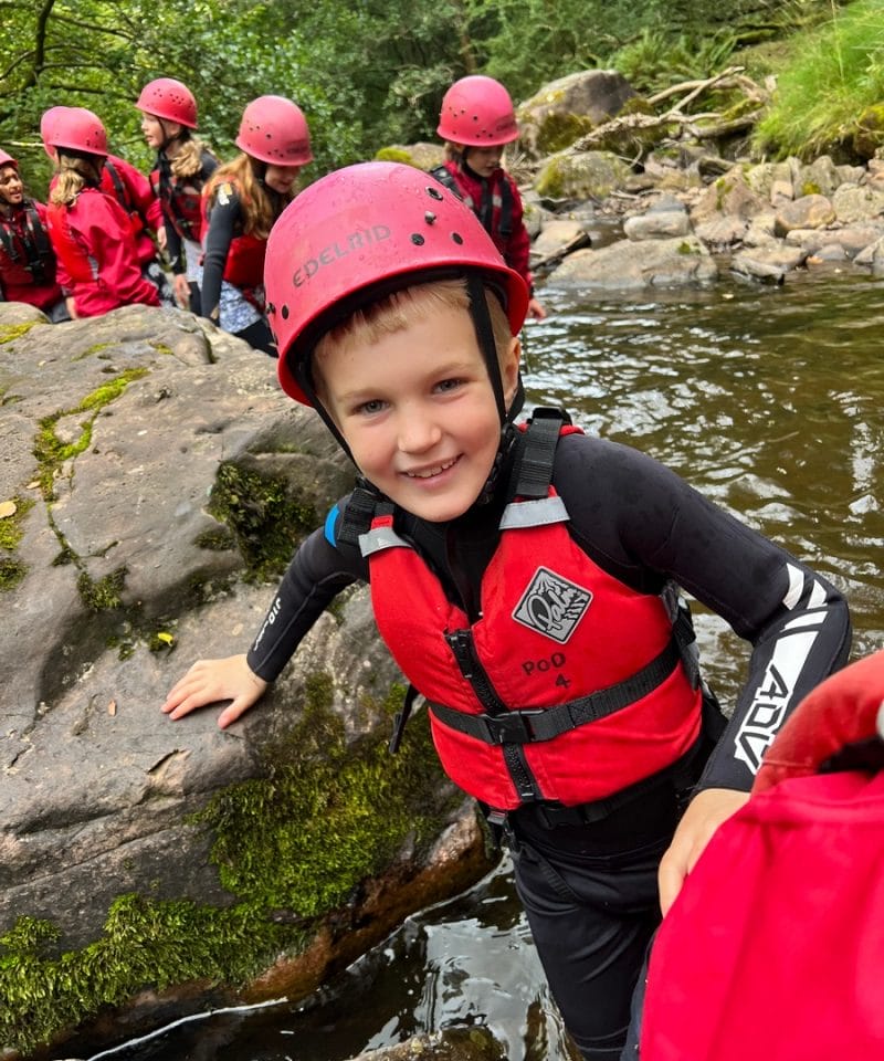 Pinewood Prep School Year 5 boy enjoying the gorge adventure at Dolygaer in Wales